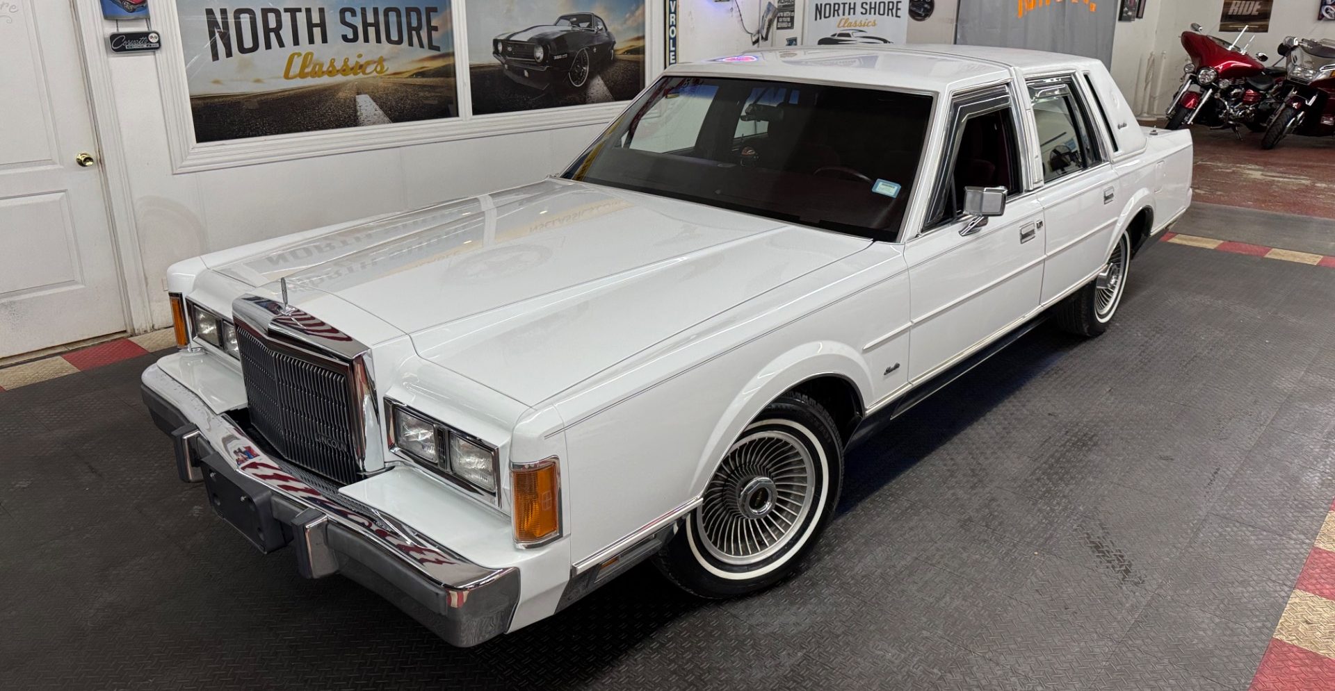 low miles luxury cars