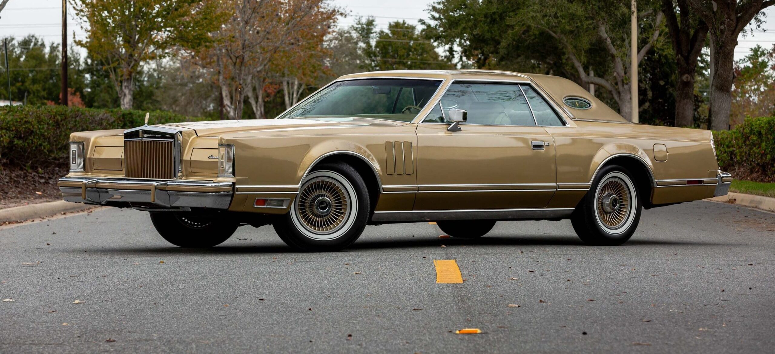 low miles luxury cars