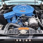C-code 289 CID V-8 with an upgraded C8 intake and Holley 4-barrel carburetor